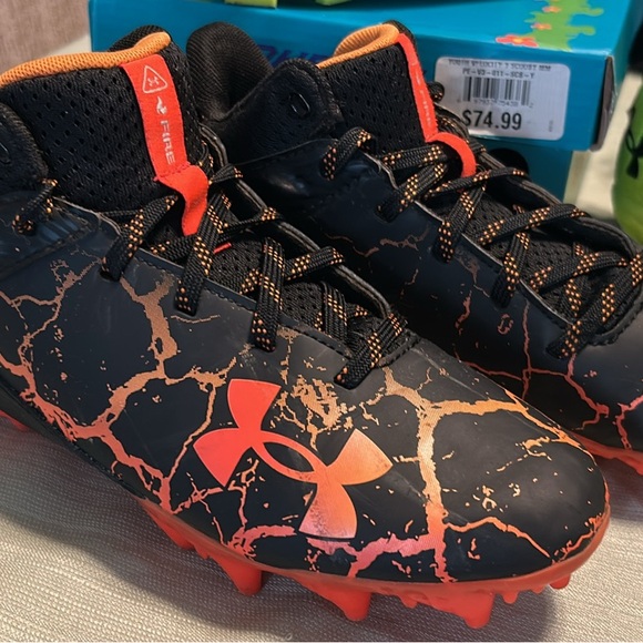 Under Armour Black and Orange Youth Football Cleats - Picture 1 of 3